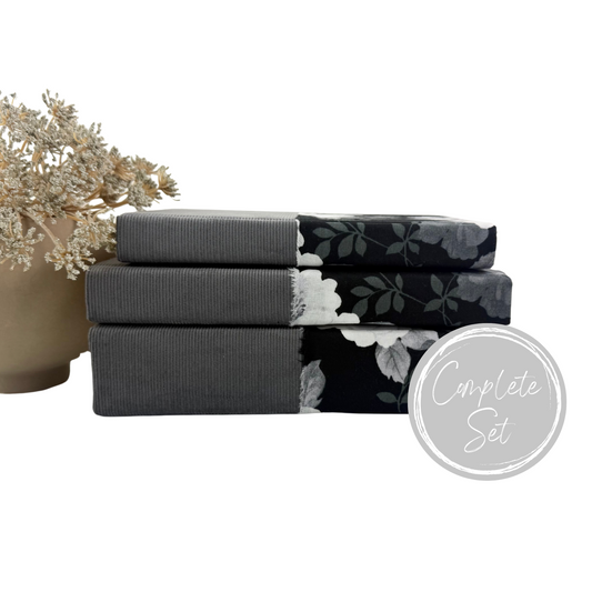 Gray and Black Fabric Covered Books