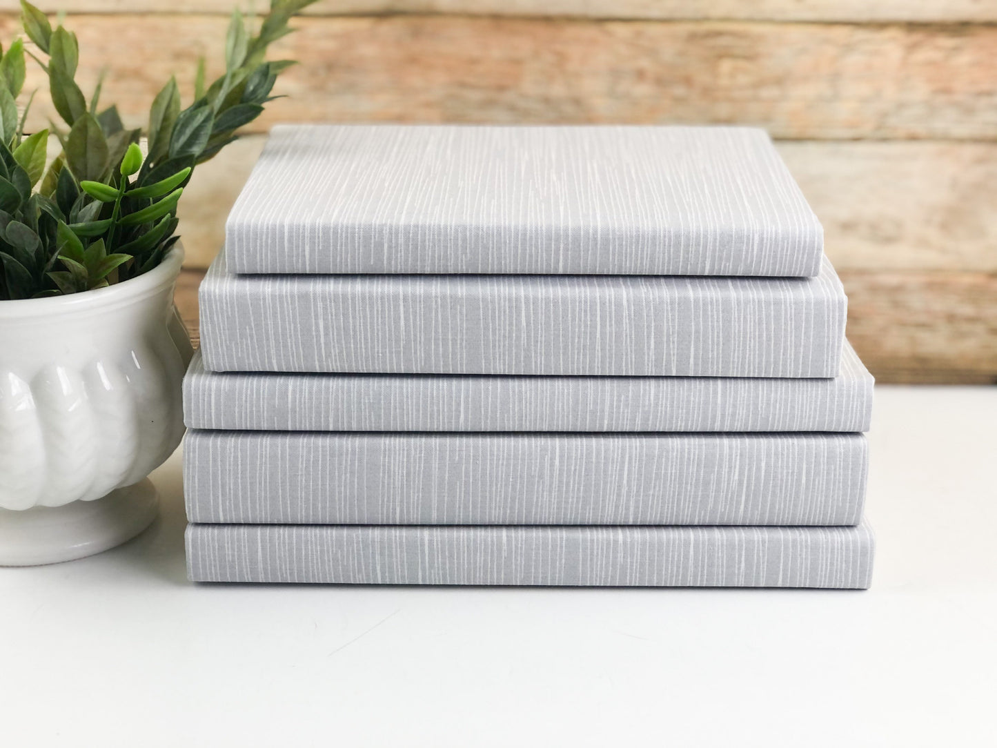 Gray Fabric Covered Books