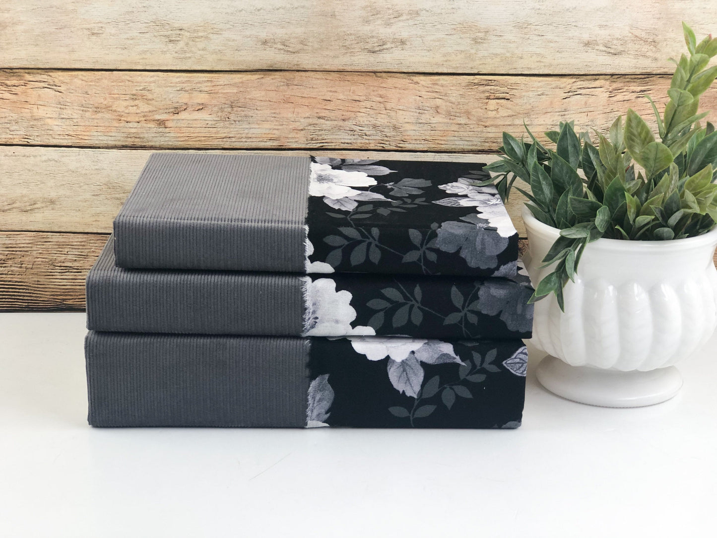 Gray and Black Fabric Covered Books
