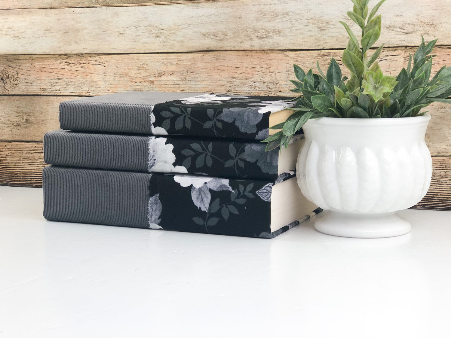 Gray and Black Fabric Covered Books