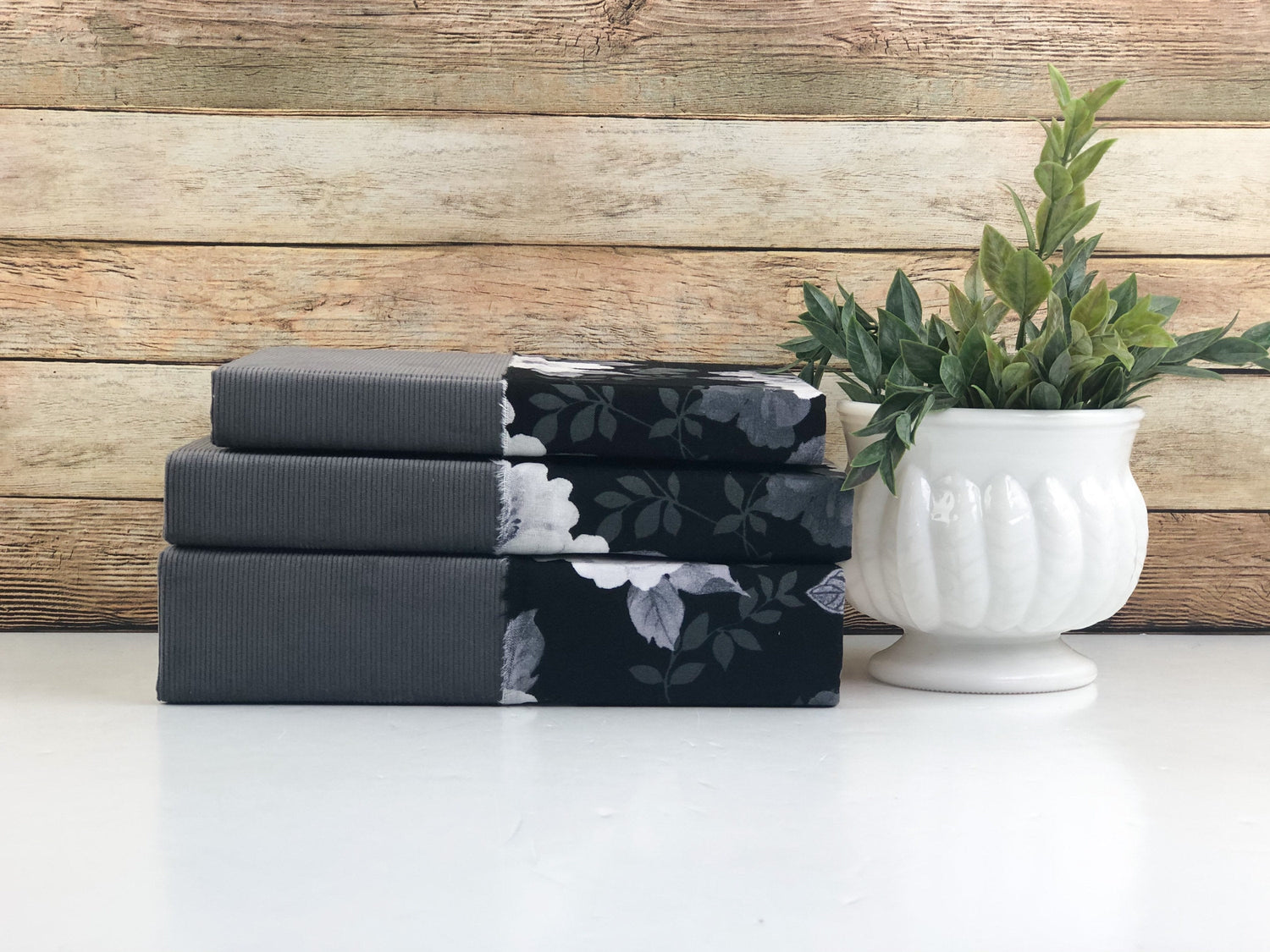 Gray and Black Fabric Covered Books