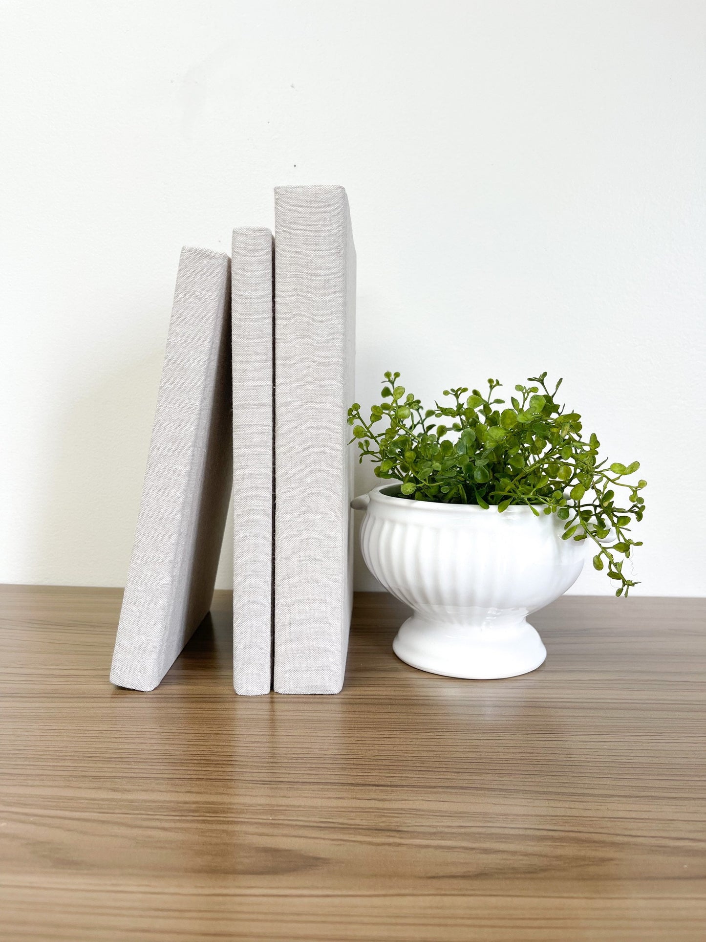 Books for Shelf Decor and White Vase