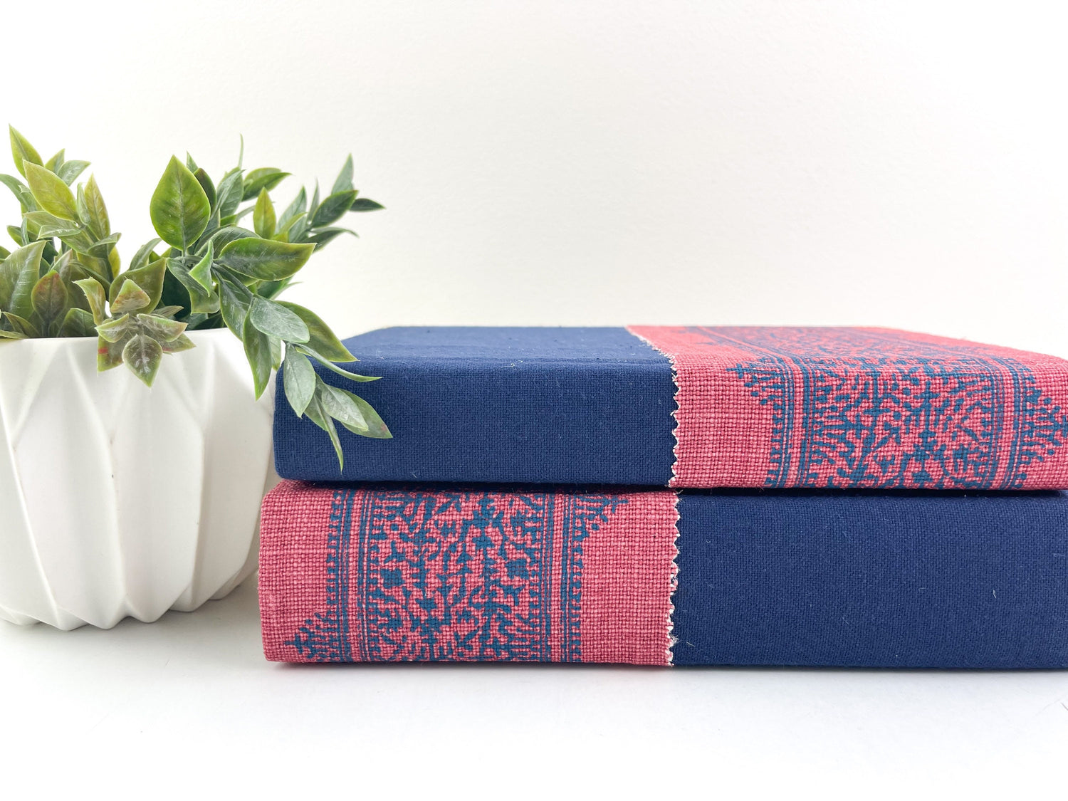 Blue and Red Fabric Covered Books